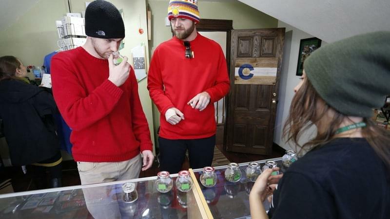 Nebraska and Oklahoma say Colorado's marijuana law is unconstitutional, in a challenge to the law in the Supreme Court. Earlier this month, visitors from Texas smell marijuana at the Breckenridge Cannabis Club.